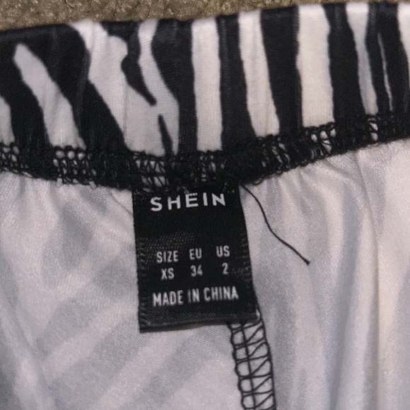 NWOT Zebra Print Flare Pants - Picture 4 of 5